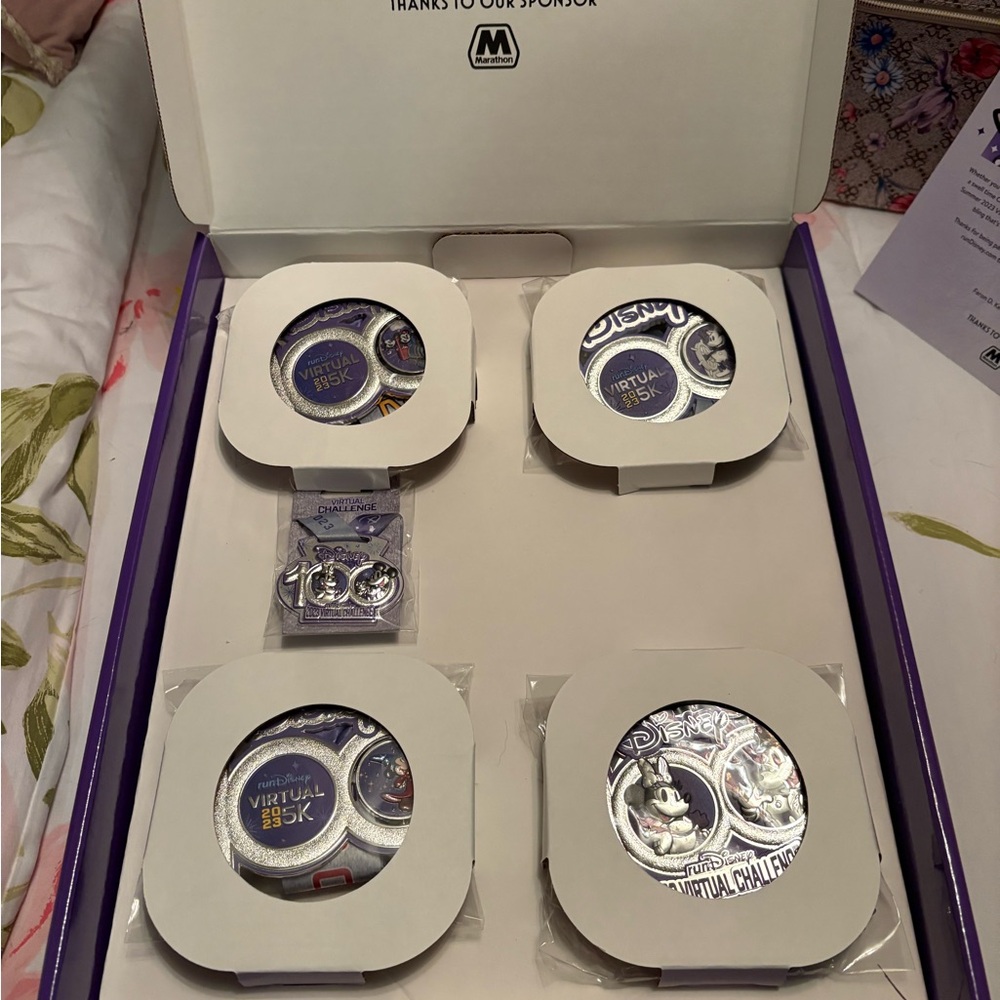 Disney 100 Celebration virtual runDisney medals. - Picture 2 of 3